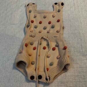 KNIT ROMPER WITH POLKA DOT DETAIL